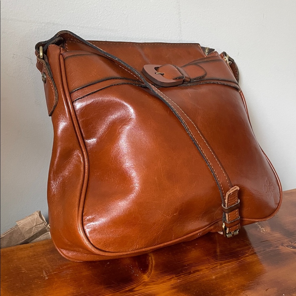 Patricia Nash Leather Saddle Crossbody Bag with Buckle Detail in Cognac - Picture 3 of 9